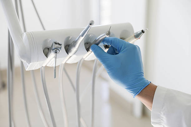 Professional Tooth Extraction technician working in Oatfield, OR